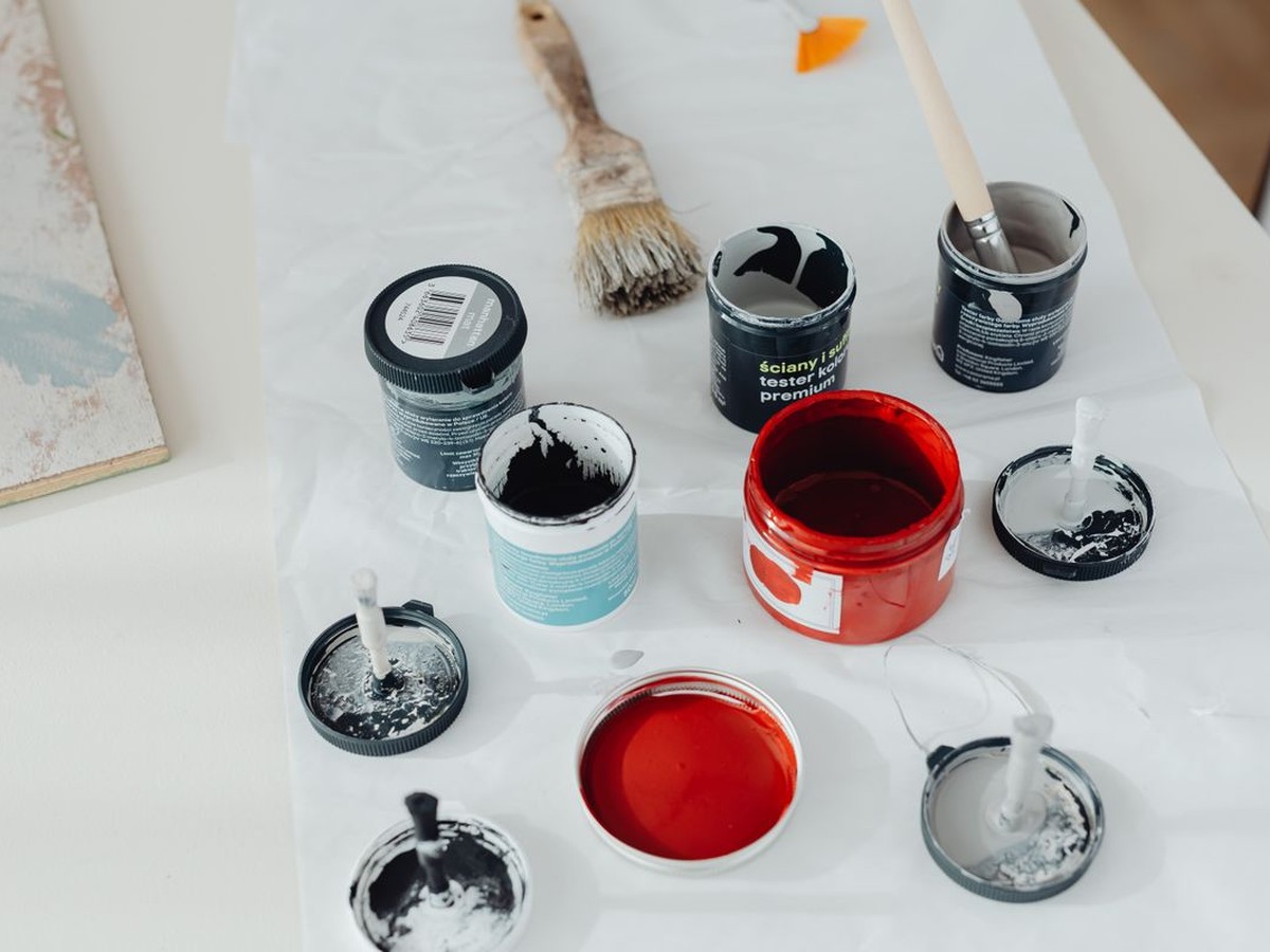 Professional paint brushes, rollers, and supplies ready for your project
